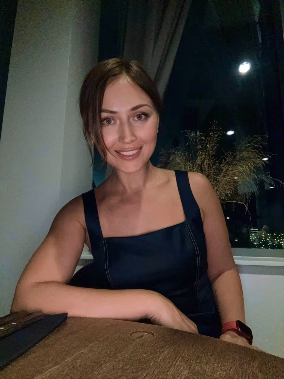 Open Woman's Profile